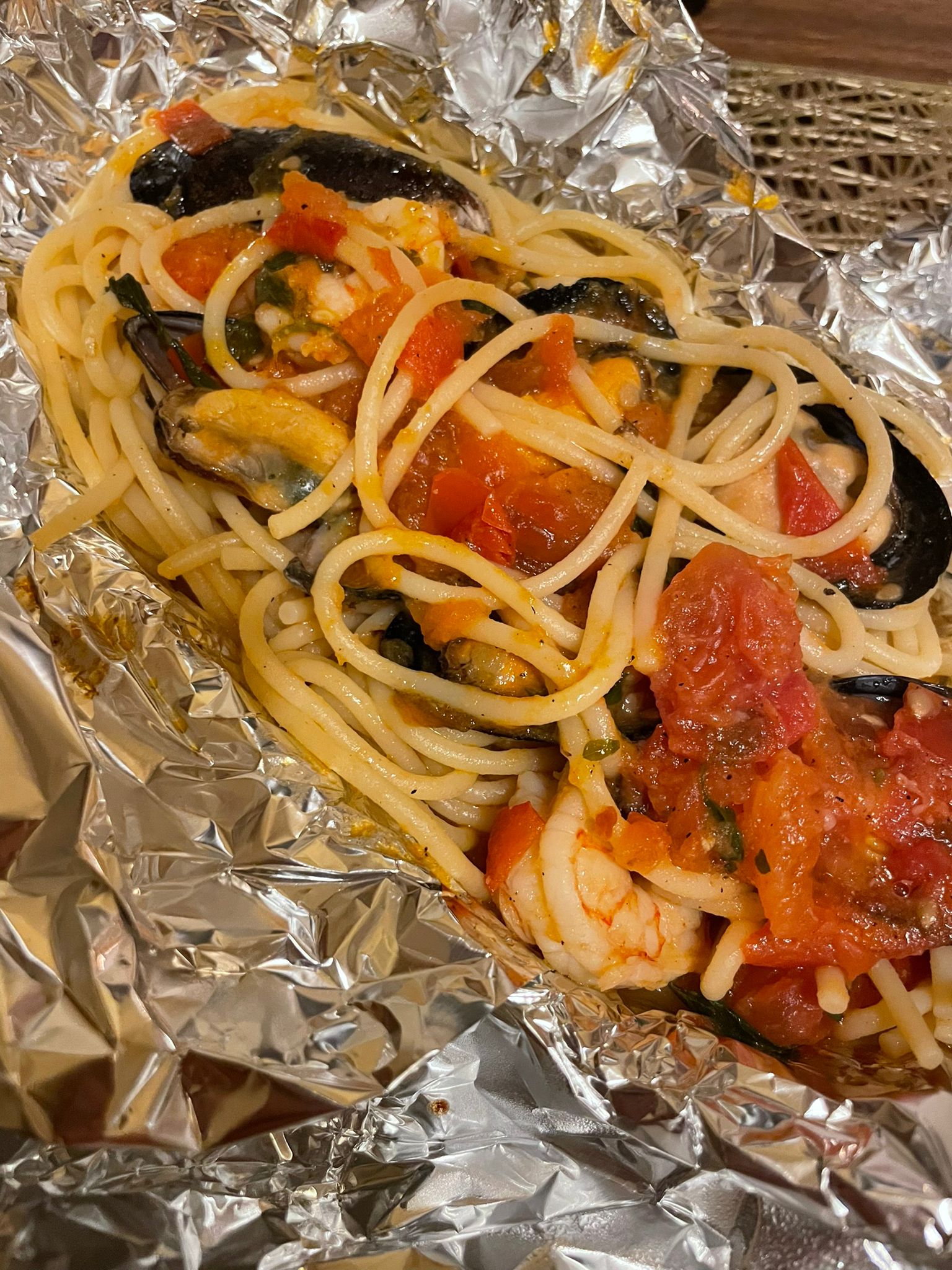 spaghetti allo scoglio al cartoccio ricetta